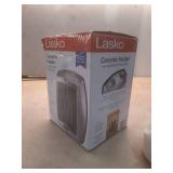 Lasko 9  1500W Electric Ceramic Space Heater with Adjustable Thermostat  Silver 754200