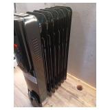 1500-Watt Black Indoor Electric Oil-Filled Radiator Convection Radiant Space Heater with Remote Control for Living Space - Retail: $100