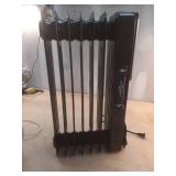 1500-Watt Black Indoor Electric Oil-Filled Radiator Convection Radiant Space Heater with Remote Control for Living Space - Retail: $100