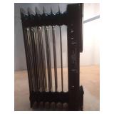 1500-Watt Black Indoor Electric Oil-Filled Radiator Convection Radiant Space Heater with Remote Control for Living Space - Retail: $100