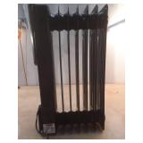 1500-Watt Black Indoor Electric Oil-Filled Radiator Convection Radiant Space Heater with Remote Control for Living Space - Retail: $100