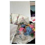 Apron, pillowcases, doilies and table toppers - crocheted and embroidered