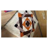 Rug 33 inches square and a cloth portfolio