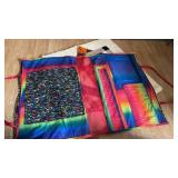 Rug 33 inches square and a cloth portfolio