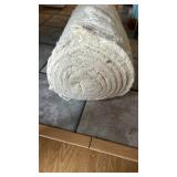 Roll of natural cotton batting