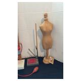 Two decorative paper mache body forms and two hem markers