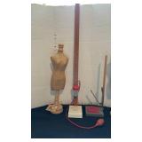 Two decorative paper mache body forms and two hem markers