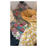 Two throw pillows and some unfinished quilting pieces