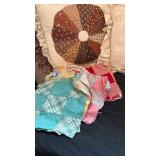 Two throw pillows and some unfinished quilting pieces