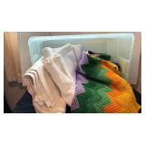 Two blankets and an afghan