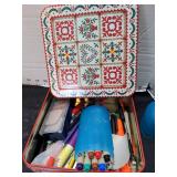 Pens and pencils in tins