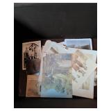 Brown velvet storage box with old photographs