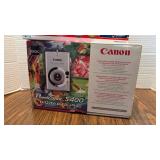 Cannon Power Shot and Weather Alert Radio