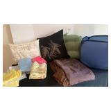 Pillows, misc towels, washcloths, brown shear curtain and folding hamper