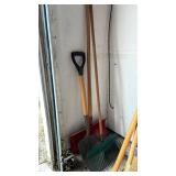 Two shovels and a rake