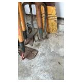 Pitchfork, garden tools and a broom