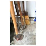 Pitchfork, garden tools and a broom
