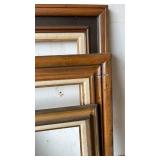 Three wooden picture frames