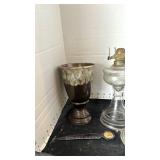 Two kerosene lamps, two vases and more
