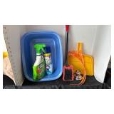 Tub of cleaning supplies