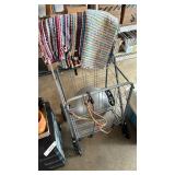 Metal cart on wheels, rugs and bungees