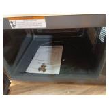 21 in. 1.1 cu. ft. 1000-Watt Countertop Microwave Oven in Fingerprint Resistant Stainless Steel and Bar handle - Retail: $109