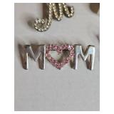 Family Name Brooch Collection