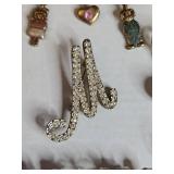 Family Name Brooch Collection