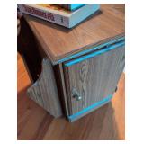 Side table/cabinet with magazine rack and pull out table. 1908 Sears Roebuck & Co. Garden Encyclopedia Book included.
