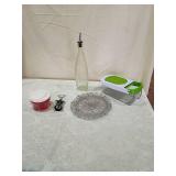 Manual Food Chopper with Red Base, steamer, wine bottle opener, glass dispenser, and vegetable chopper Manual Food Chopper with Red Base, steamer, wine bottle opener, glass dispenser, and vegetable chopper