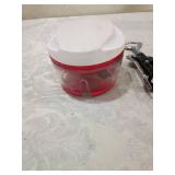 Manual Food Chopper with Red Base, steamer, wine bottle opener, glass dispenser, and vegetable chopper Manual Food Chopper with Red Base, steamer, wine bottle opener, glass dispenser, and vegetable chopper