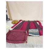 Kitchen items including a half apron two pot holders and a casserole warmer Kitchen items including a half apron two pot holders and a casserole warmer