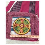 Kitchen items including a half apron two pot holders and a casserole warmer Kitchen items including a half apron two pot holders and a casserole warmer