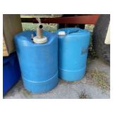 2 blue jugs under wagon