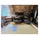 Set of pots & pans, cutting board