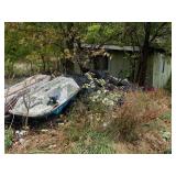 Pile of Cans and Paddle Boat As Is