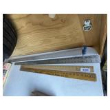 Stack of yard sticks & more