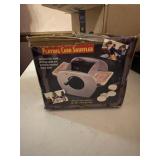 Basket, brushes, office supplies, box of games