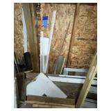 All wood pieces on floor between arrows