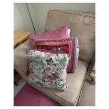 Stack of pillows, chair type throw