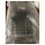 Black fan & adding machine