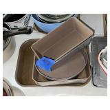 2 stacks baking dishes & pans