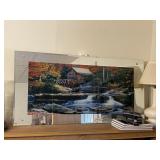 Lighted mirror water scene