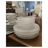 3 stacks of glassware