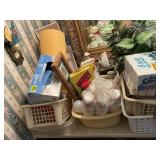 Bathroom supplies on left side of vanity