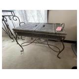 Wicker basket topped wrought iron side table