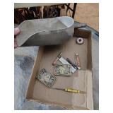 belt buckles, knives and feed scoop