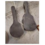 empty banjo and guitar cases