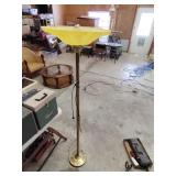 Floor lamp has plastic top