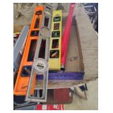 pipe wrenches and levels